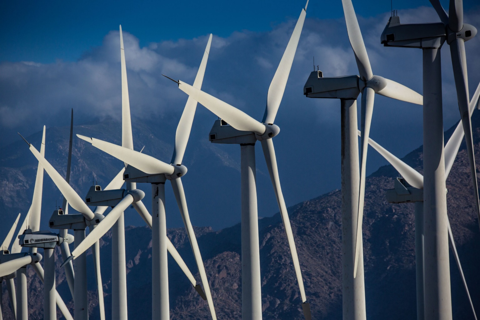 A jumble of electricity producing wind turbines are viewed along Interstate 10 on May 9, 2022 in Palm Springs, California. Credit: George Rose/Getty Images