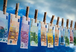 Money Laundering Euro notes with different value hanging on a line for drying money laundering euro stock pictures, royalty-free photos & images